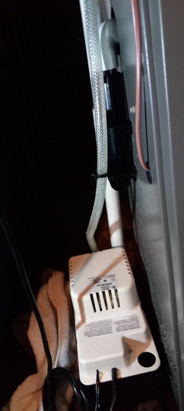 Responded to emergency call for water leaking into furnace from condensate system. Diagnosed issue as improperly installed condensate trap that wasn't secured to the furnace. Repaired by properly sealing the connection between the trap and threaded 90-degree fitting, then securely fastened the trap to the furnace to prevent future leakage.