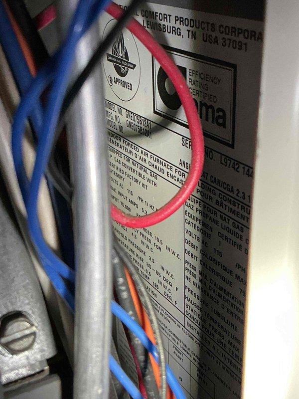 Responded to no-heat call for Comfort Products Corporation furnace. Diagnosed multiple issues including failed heat exchanger with crack on eyelet and non-functional blower motor causing humming noise and overheating. Unit is 22 years old, significantly beyond typical service life. Previous service was performed approximately one month ago for noise complaints.