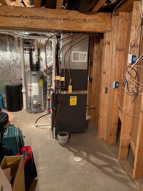 Performed scheduled tune-up on 10-year-old Daikin furnace which was operational but leaking water. Diagnosed worn inducer gasket causing the leak and applied high-temperature silicone as temporary seal until replacement gasket can be installed. Customer noted occasional hose plugging issues which was also inspected during service.