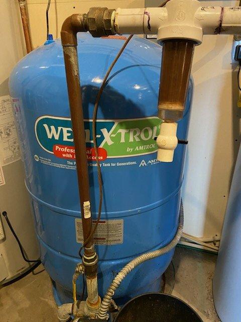 Performed routine maintenance service on residential water treatment system. Identified improperly oriented sediment filter and corrected flow direction. Verified functionality of existing water softener and advised homeowner about aging pressure tank and water heater (15+ years old) that may require replacement soon.