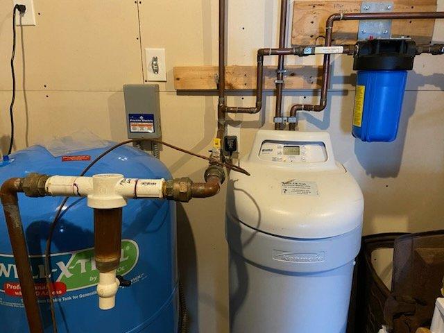 Performed routine maintenance service on residential water treatment system. Identified improperly oriented sediment filter and corrected flow direction. Verified functionality of existing water softener and advised homeowner about aging pressure tank and water heater (15+ years old) that may require replacement soon.
