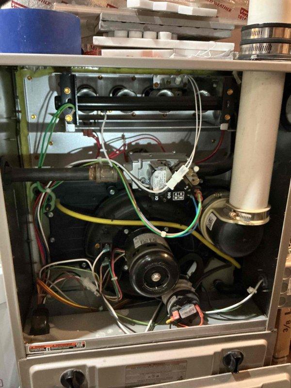 Investigated customer complaint of insufficient heat in one upstairs bedroom. Performed full system inspection including damper positions, ductwork, and furnace settings, with inspection of control board and blower assembly. Determined issue is likely caused by duct design limitations with airflow taking path of least resistance. Recommended installation of duct booster fan and window replacement to improve room comfort and heat retention.