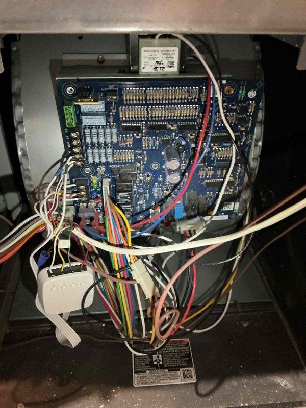 Investigated customer complaint of insufficient heat in one upstairs bedroom. Performed full system inspection including damper positions, ductwork, and furnace settings, with inspection of control board and blower assembly. Determined issue is likely caused by duct design limitations with airflow taking path of least resistance. Recommended installation of duct booster fan and window replacement to improve room comfort and heat retention.