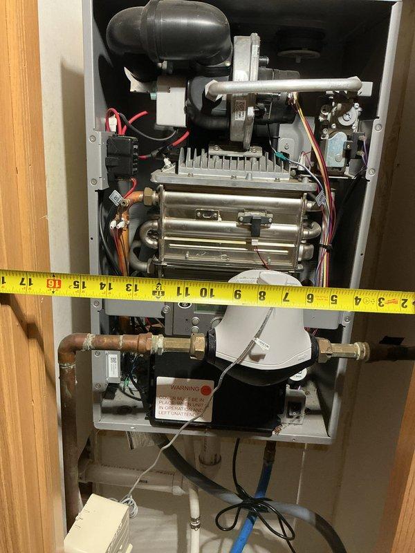 Diagnosed non-operational Westinghouse electric tankless water heater. Inspected internal components including heat exchanger, wiring connections, and control systems. Due to irreparable condition, completed documentation for replacement unit through emergency service request.