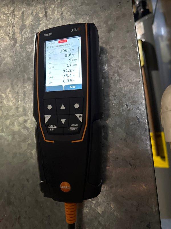 Performed diagnostic evaluation on 27-year-old Ruud furnace that had stopped working. Testing revealed multiple age-related issues including rust in cabinet, dirty blower wheel, high inducer amp draw (measured at 0.25A), and aging electrical components. Combustion analysis confirmed system is currently operating safely with 92.2% efficiency, 9.6% O₂, and CO levels within acceptable range (9 ppm). Restored heat functionality but advised customer on replacement options for furnace, AC, and generator due to system's advanced age and deteriorating condition.