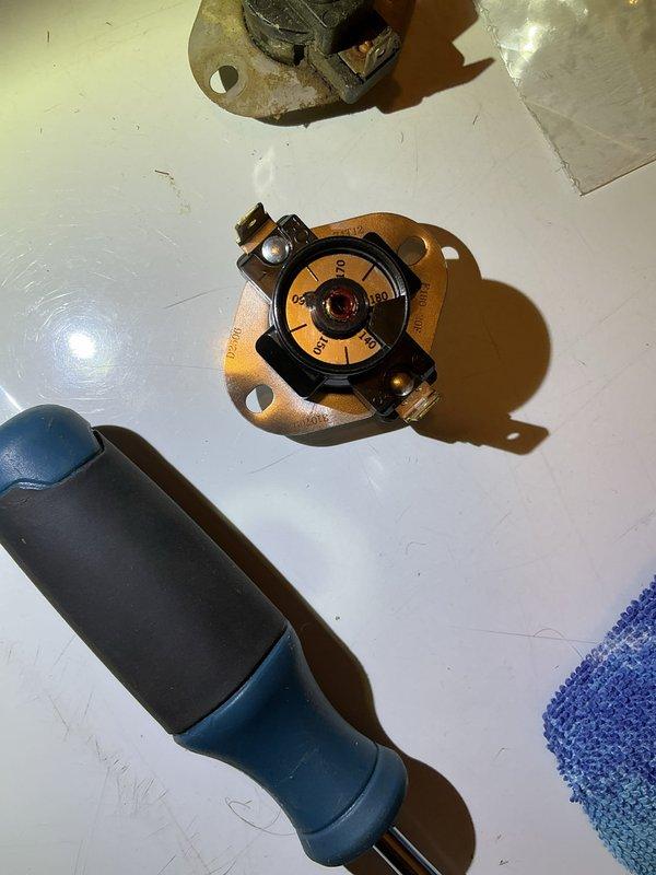 Diagnosed furnace with no heat condition in mobile home HVAC system. Found high limit switch had tripped, causing pilot light failure. Reset high limit switch to temporarily restore system operation. Performed voltage testing with multimeter to verify electrical components. Ordered replacement high limit switch to prevent recurrence. System operational upon departure.