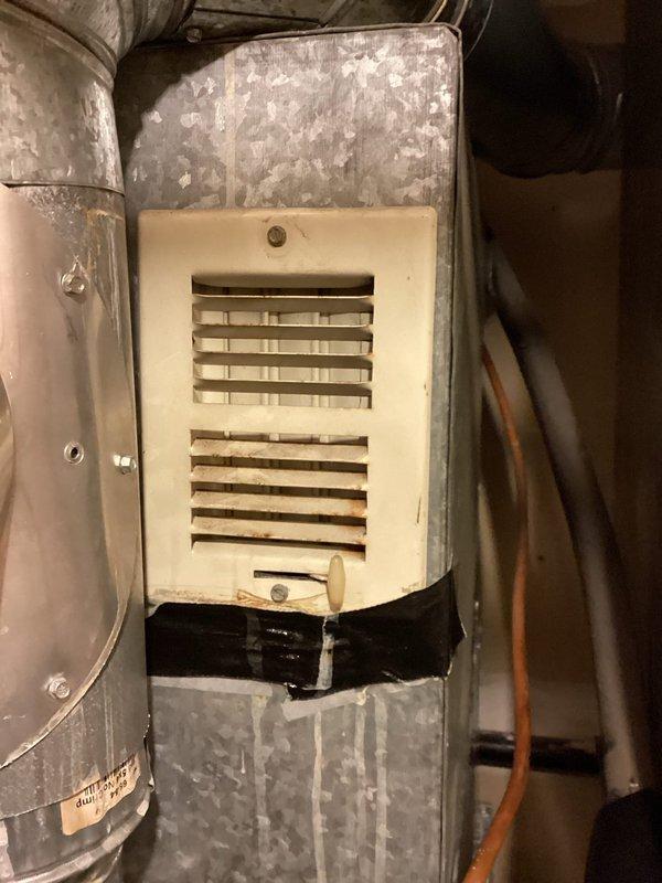 Responded to no heat service call for 12-year-old furnace. Homeowner reported clicking noise and flashing red light. Diagnostic inspection revealed normal system operation - red indicator light is standard during heating cycle as verified by flame sensor activation. Inspected gas connections and confirmed no leaks present. Explained to customer that elevated temperature in furnace room is due to supply vent placement directly above unit. No repairs necessary; system functioning properly as installed last year.
