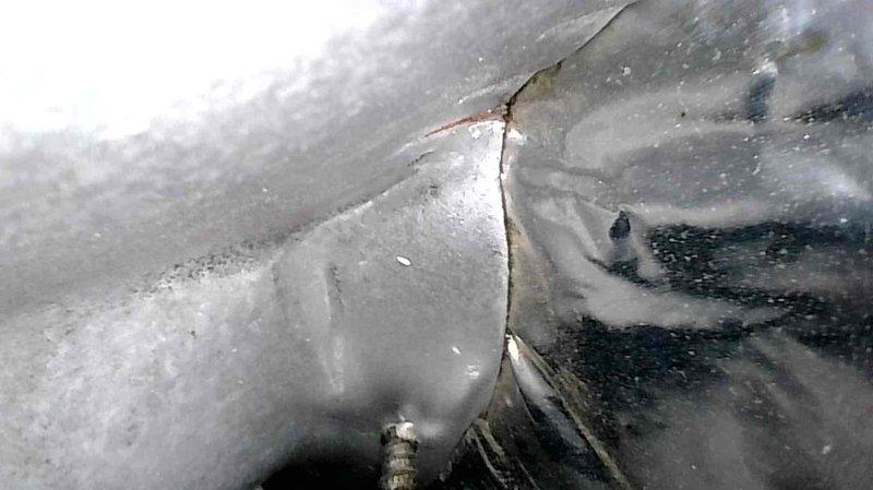 Responded to a no-heat service call for a 20-year-old HVAC system showing control board fault code (6 flashes) and blowing cold air. Diagnostic inspection revealed both a faulty control board and a significant crack in the heat exchanger, which was documented with photos and shown to the homeowner via live camera. Although the crack has not yet extended past the crimp, the situation was explained as a safety hazard. Homeowner elected to contact local contractors before proceeding with repairs.