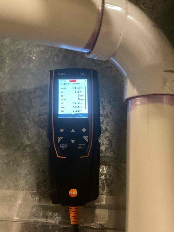 Replaced failed PSC draft combustion inducer blower assembly on customer's furnace. Completed installation of new inducer motor assembly and verified proper operation. Post-repair combustion analysis with Testo 310 confirmed optimal performance with 97.2% efficiency, CO2 at 8 ppm, and CO at 5 ppm.
