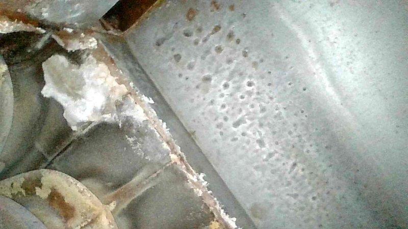 Inspected boiler after CO detector activation prompted fire department response. Discovered a crack in boiler jacket beneath heat exchanger, causing carbon monoxide to be drawn into the home. Recommended complete boiler replacement and established temporary arrangements for customer pending installation of new equipment.