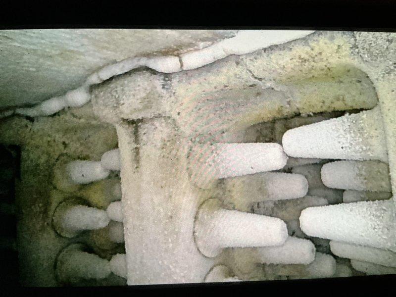 Responded to service call for non-functioning boiler system exhibiting loud squealing noise. Diagnostic inspection revealed failed inducer motor and severely plugged heat exchanger. Visual inspection confirmed extensive frost accumulation on components and significant corrosion on pressure gauge assembly. Performed complete replacement of inducer motor and boiler unit to restore proper heating function.