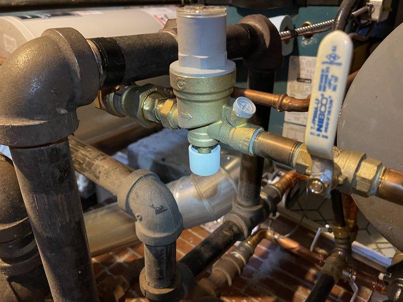Responded to warranty call for boiler system leakage. Replaced defective valve but system continues to leak from relief valve with abnormally high pressure (30 psi), indicating potential issues with the auto fill valve. Expansion tank (Amtrol Extrol) may also be malfunctioning. Documented both parts needed and scheduled estimate for complete repair.