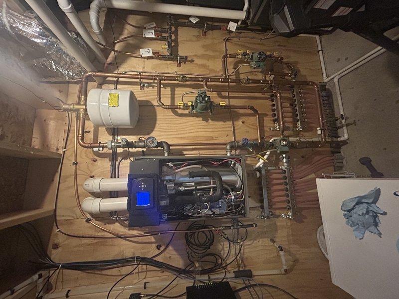 Performed annual boiler tune-up for new Family Reward member. Tested boiler operation at full temperature, verified proper system pressure, and cleaned the igniter. Discovered and partially removed a dead bird from the condensate trap, restoring normal operation. Inspected expansion tank and system for leaks; all components functioning properly.