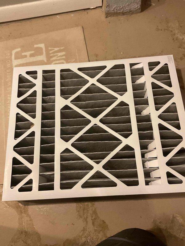Responded to heating issue where furnace was not maintaining temperature or auto-activating at set point (69°). Diagnosed system with dirty filter restricting airflow. Replaced air filter to restore proper system function and air circulation.