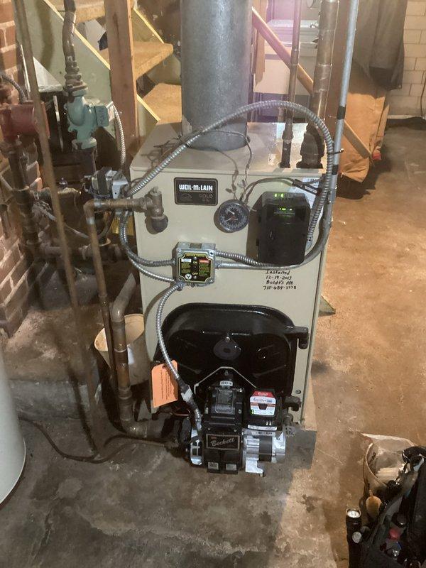 Performed preventive maintenance on Weil-McLain oil boiler and oil furnace at rental property. Replaced oil nozzle on furnace with correct size. Noted missing appropriate size nozzle for boiler - submitted parts order and scheduled return visit to complete boiler service. Both units otherwise operational with no issues identified.