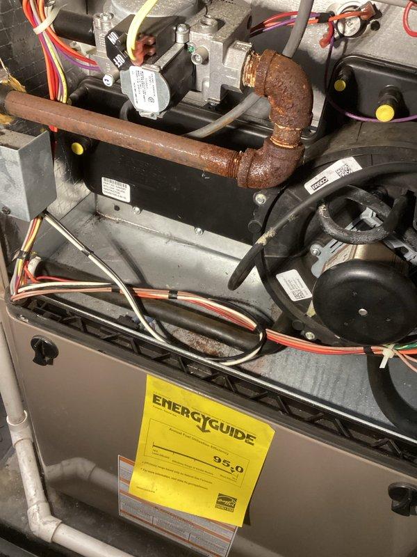 Performed a 2-hour sold repair involving complete replacement of burners on the furnace due to deterioration. Performed comprehensive system checks including flame sensor, ignitor, inducer, condensate lines, venting, gas valve, and gas pressure. Drained water from inducer and condensate lines. After repairs, verified proper operation with post-service exhaust flue readings at 57ppm and confirmed normal system functionality through thermostat cycling.