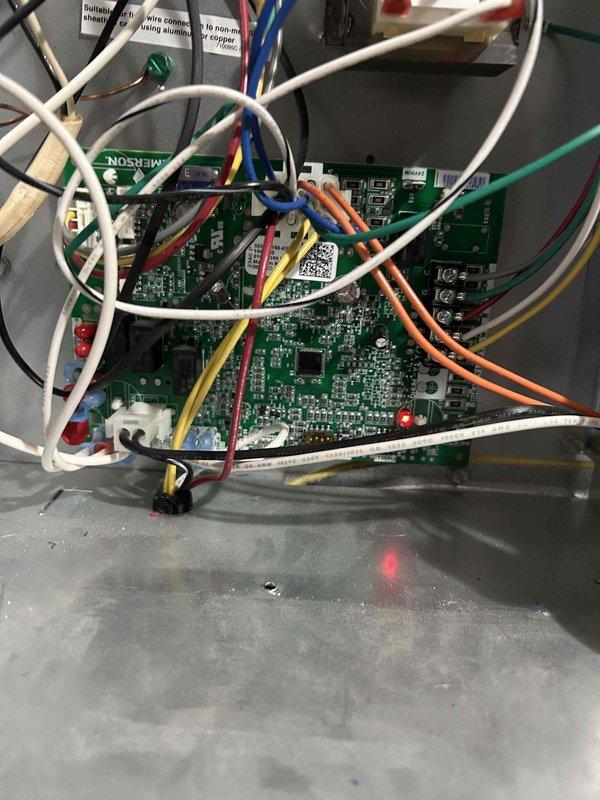 Responded to no heat complaint on recently installed system (1 year old). Diagnosed failed control board with no power/LED indication despite confirmed power supply and heat call. Temporarily restored operation by cycling power. Supply air temperature verified at 117.5°F after restart. Noted requirement for replacement control board to permanently resolve intermittent failure issue.