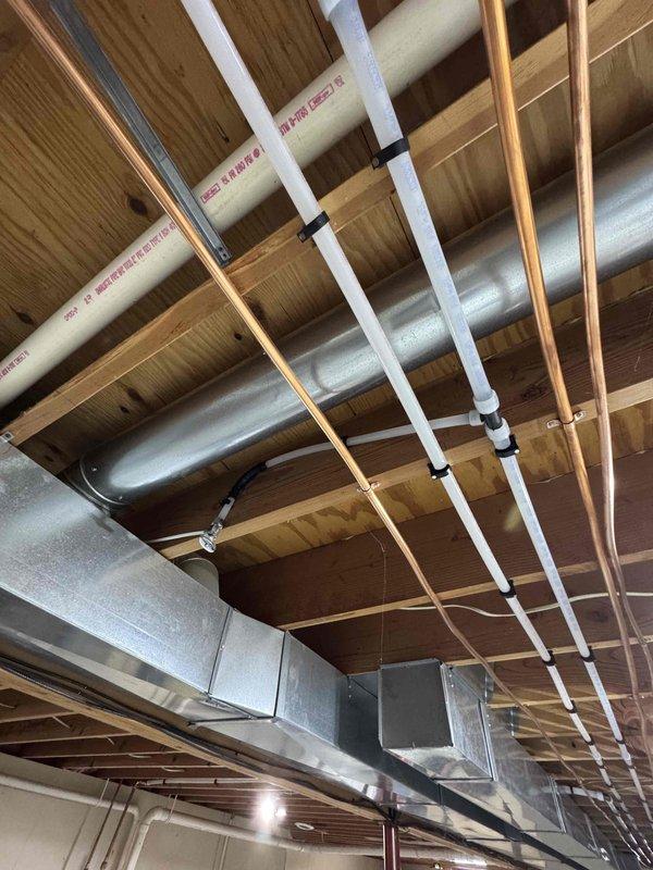 Completed comprehensive repiping work to address leaking copper piping. Removed damaged sections and installed new PVC supply lines with proper mounting brackets throughout the ceiling infrastructure. Implemented water care treatment to protect the newly installed system and prevent future corrosion issues.