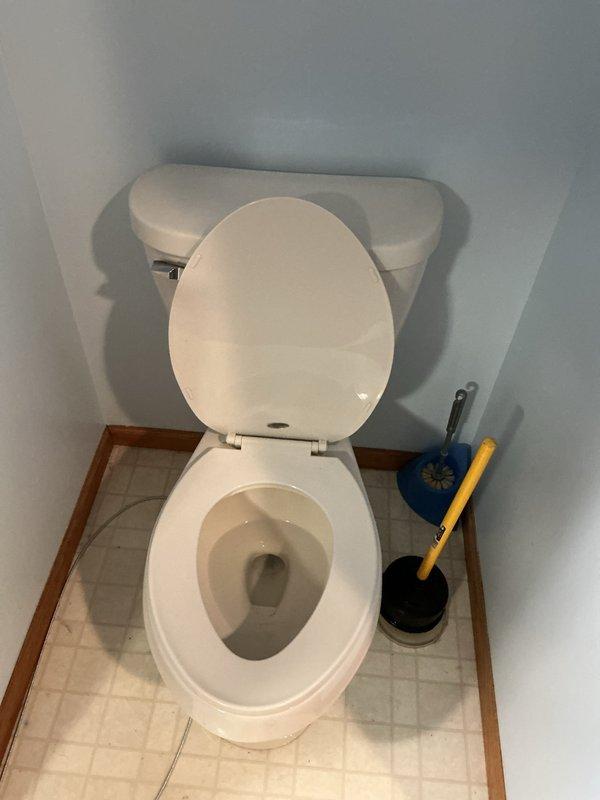 Successfully unclogged toilet using customer's plunger after single attempt. Toilet was completely non-functional prior to service but restored to proper flushing operation.