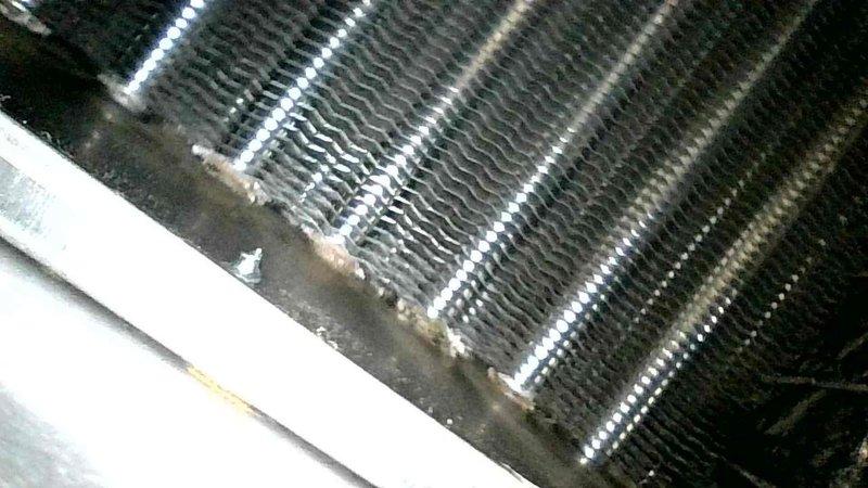 Responded to no-heat call for natural gas furnace 10+ years of age. Diagnosed failed ignitor, signs of cold end header box leakage, and early-stage burner deterioration. Performed visual inspection of heat exchanger which showed acceptable condition. Installed new ignitor, tested system operation with satisfactory results.