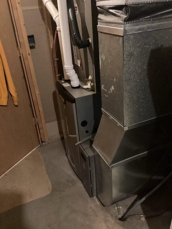 Performed annual furnace tune-up on 1-year-old FRP unit. Identified and repaired condensate leak at trap by applying silicone. Noted severely dirty filter (unchanged for over 1 year), advised customer to replace. All electrical components tested within specifications, heat exchanger inspected with no compromises found. Verified proper LP gas pressures with 45-degree temperature rise and confirmed normal system operation after repair.