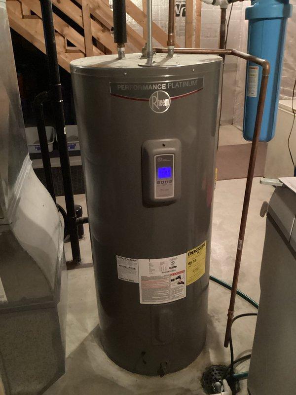 Diagnosed Rheem Performance Platinum electric water heater displaying a 12-4 error code indicating lower element failure. Determined that the lower element resistor had failed while the heating element itself was still functional. Replaced faulty resistor component to restore proper operation of the water heater system.