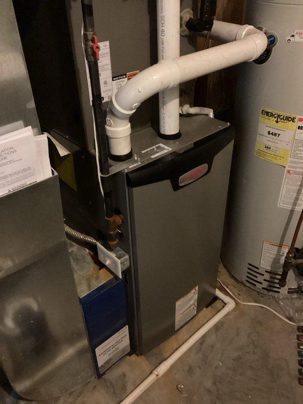 Responded to a no heat service callback where previous service could not identify the issue. Diagnosed furnace failure due to pressure switch activation caused by an obstruction in the exhaust system. Removed rocks from the intake pipe, verified proper pressure readings, and reinstalled exterior components. Unit now operating normally and providing adequate heat to the residence.