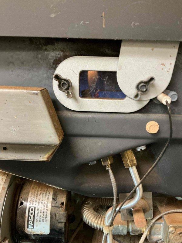 Performed safety inspection on 25-year-old direct vent heater in detached loft. Verified no gas leaks, no heat exchanger cracks, and no CO leakage. Identified non-operational blower motor and absence of high limit safety switch, with recommendation to consider replacement as heat exchanger is at risk of cracking under continued stress.