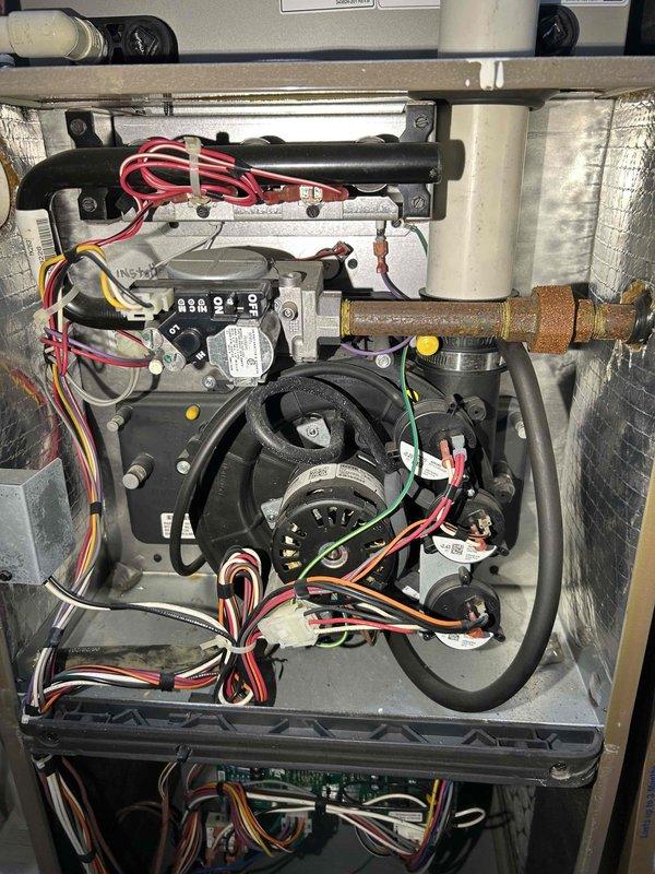 Performed annual maintenance on 2-year-old York furnace. Identified and resolved flame failure issue by clearing pressure switch and inspecting burners for obstructions. Performed comprehensive inspection including heat exchanger examination, combustion analysis testing, and condensation trap cleaning. Replaced weak flame sensor (measured at 1.9 microamps) to restore proper system operation.