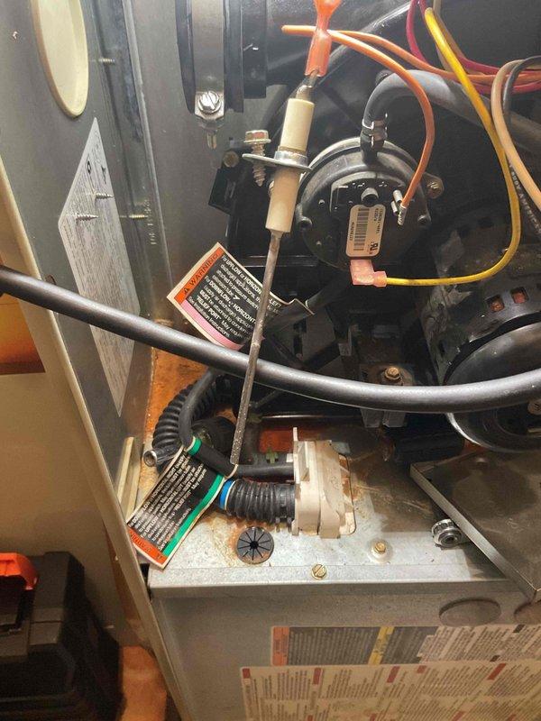 Performed standard furnace tune-up service on two furnace units in customer-owned duplex property. Inspection revealed aging system with failing inducer motor requiring replacement. Recommended full unit replacement due to advanced age and deteriorating components, as evidenced by corrosion on metal surfaces and worn internal parts.