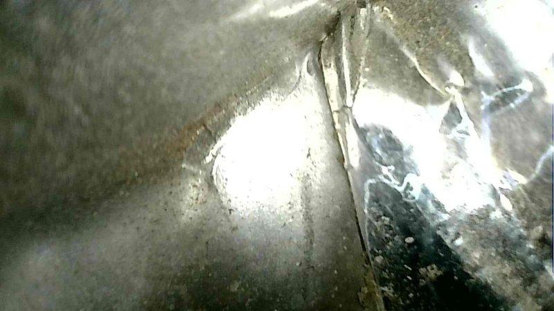 Performed standard furnace tune-up service on two furnace units in customer-owned duplex property. Inspection revealed aging system with failing inducer motor requiring replacement. Recommended full unit replacement due to advanced age and deteriorating components, as evidenced by corrosion on metal surfaces and worn internal parts.