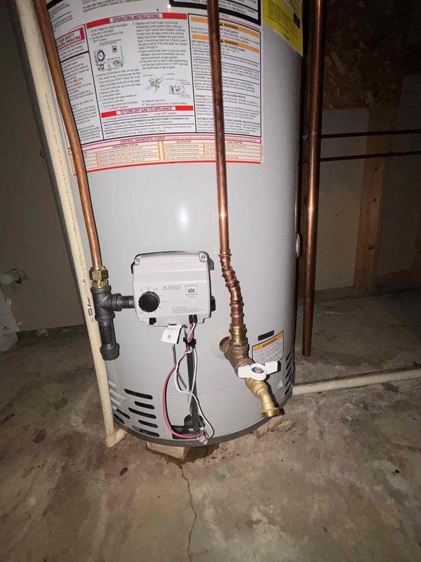 Successfully replaced a leaking 75-gallon natural gas power vent water heater due to tank failure. Installation included proper connection of copper lines, venting system, and all required valves. Bradford White unit was installed and tested to ensure proper operation.