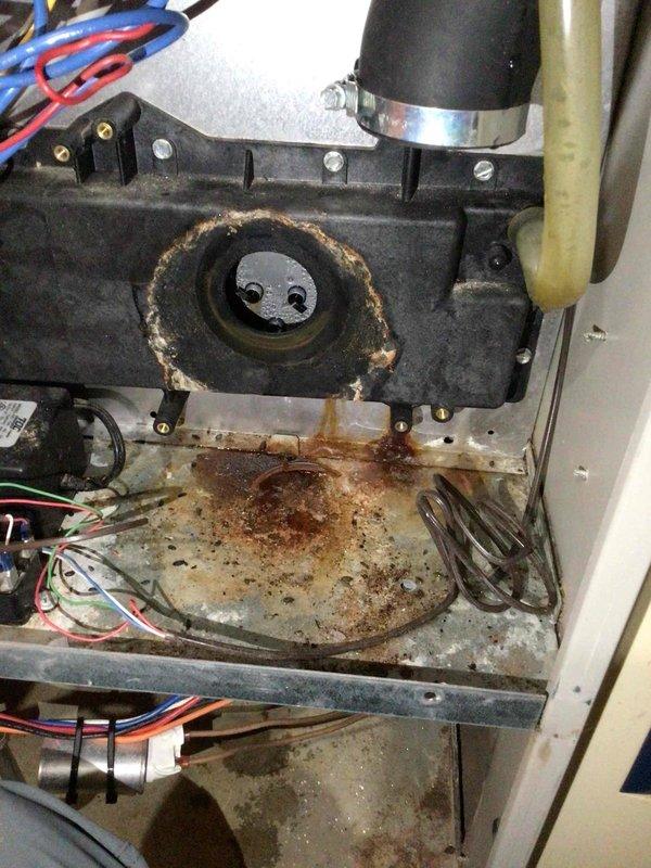 Replaced failed condensate pump that was causing furnace leakage. Performed diagnostic camera inspection revealing significant corrosion in the heat exchanger area and mouse intrusion. Discussed with homeowner the need for future repairs due to deteriorating components and recommended duct cleaning to address accumulated dust and pest contamination.