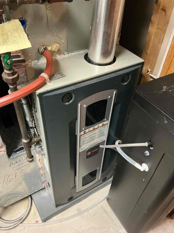Responded to a service call to verify operational status of a furnace and water heater after customer accidentally shut off gas supply. Both appliances were confirmed functioning correctly through operational testing - hot water demand successfully triggered water heater ignition and thermostat adjustment verified proper furnace heating function. Advised customer against partial gas valve closure due to potential equipment damage from improper gas pressure. Documented condition of Bradford White water heater and residential furnace with exhaust and condensate systems intact.