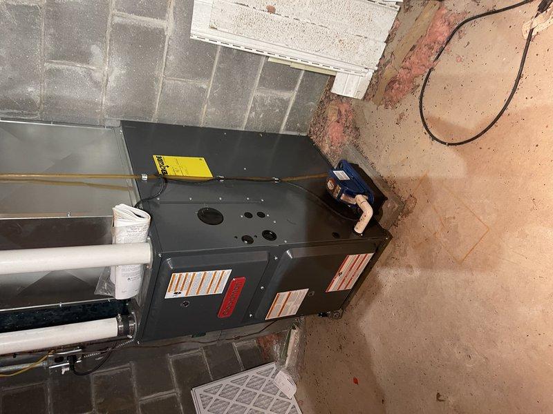 Responded to service call at customer's bunk house for a missing plug on the side of the Goodman furnace, which was likely dislodged during previous gas valve replacement service. Located and reinstalled the missing furnace plug to restore proper operation and system integrity.