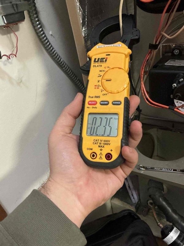 Responded to no heat complaint for 5-year-old York furnace. Diagnosed weak flame sensor signal, performed cleaning of flame sensor which restored proper microamp readings (approximately 2 µA). Conducted comprehensive system check with multimeter verification showing all other components functioning correctly. Unit now operating safely with normal heat production.
