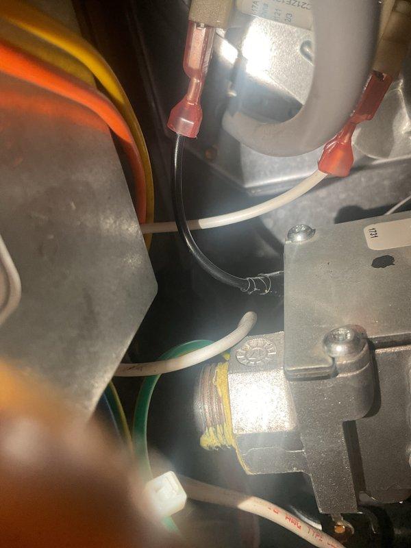 Performed scheduled maintenance on two forced air furnaces. Identified and addressed three issues: replaced dirty filter, repaired disconnected condensate drain hose causing leakage, and temporarily secured loose inducer motor wiring with electrical tape as an interim fix until permanent repair can be completed.