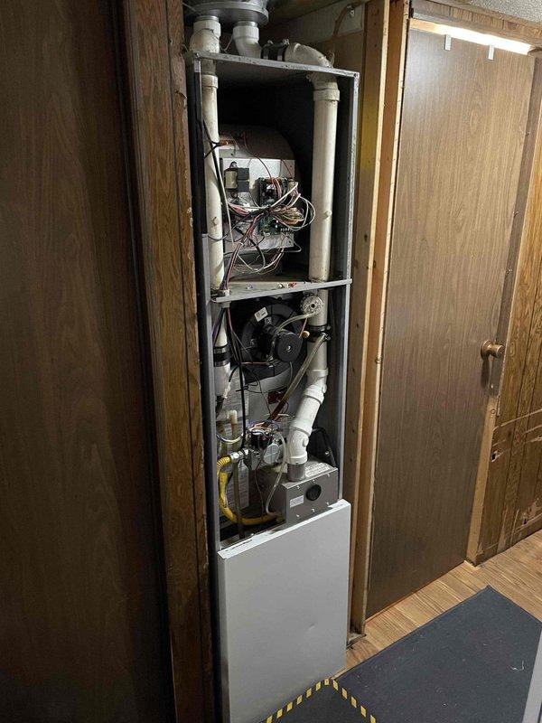 Responded to customer concern about furnace noise during operation. Diagnostic inspection revealed mild inducer motor noise and labored blower motor startup. Heat exchanger was examined and found in satisfactory condition with furnace operating within acceptable parameters. Customer was advised about current component condition and potential future replacement needs for inducer and blower motors if symptoms worsen.