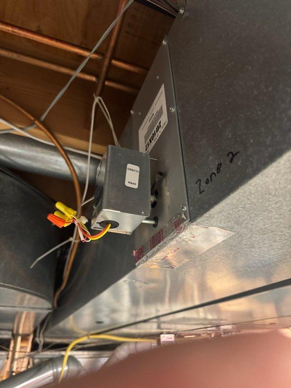 Conducted diagnostic inspection on 3-zone ductwork system following customer report of loud noise. Identified failed zone head (Zone 2) and replaced defective component. Also performed scheduled maintenance including replacement of Aprilaire 600 humidifier filter pad and complete system inspection on 10-year-old furnace.