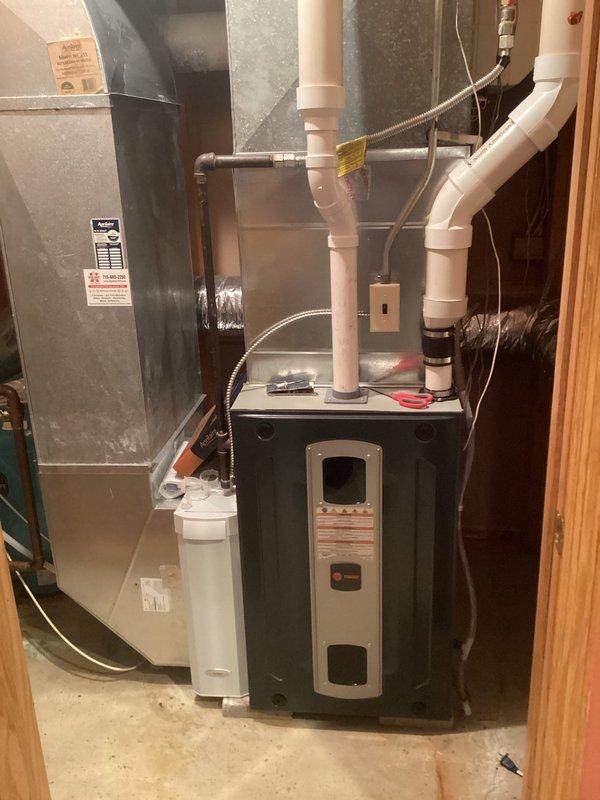 Performed routine furnace tune-up on 8-year-old FRP unit. Inspected components including filter (noted as requiring replacement), blower (clean and balanced), and heat exchanger (no compromises). Identified leaking inducer seal at collector box causing noise and potential electrical hazard. Tested system operation for 20 minutes with proper gas pressures and verified venting integrity. Customer requested estimate for inducer motor repair.
