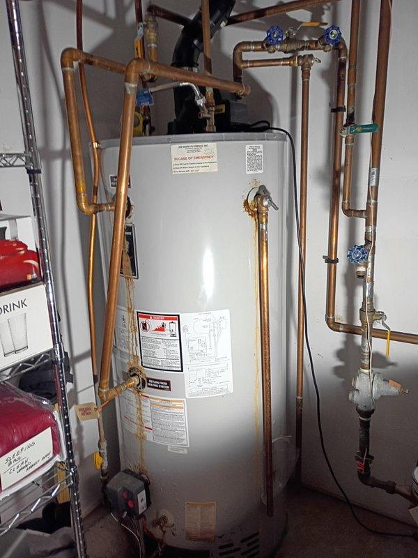 Responded to customer with non-operational Bradford White 72-gallon natural gas water heater. Upon inspection, found unit was leaking and failed to ignite, requiring immediate shutdown with power disconnected and water supply to home turned off. Customer informed of replacement options and HVAC service advisor requested for quote on tankless combi boiler replacement.