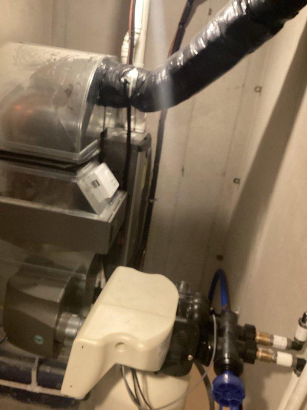 Performed annual maintenance on two residential heating systems: 10-year-old boiler and 11-year-old furnace under rewards membership program. Disassembled and cleaned ultra boiler heat exchanger in main house, replaced customer-supplied humidifier water panel and filters. Restored disconnected thermostat to proper operation. At cottage, serviced furnace by cleaning flame sensor and condensate components, and performed standard boiler maintenance without disassembly as inspection indicated minimal fouling. All systems verified operational upon completion.