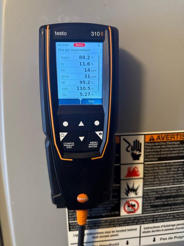Performed annual furnace tune-up on 10+ year old system. Conducted comprehensive inspection confirming proper combustion (95.2% efficiency verified by Testo analyzer with CO levels at 14 ppm), cleaned flame sensor and ignitor, checked electrical connections, and confirmed clear condensate drains. System is operating safely with no issues identified.