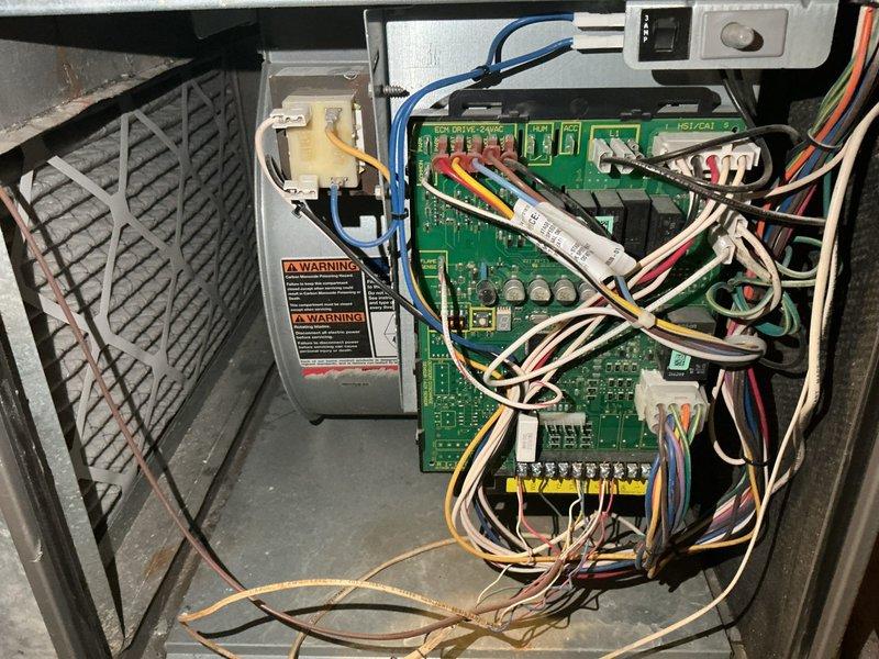 Responded to no-heat call for 15-year-old forced air furnace with intermittent operation. Diagnosed multiple component failures including failing ignitor, leaking inducer motor and collector box. Found flame sensor had been cleaned by customer prior to arrival. Due to age and extent of issues, recommended and replaced complete furnace system.