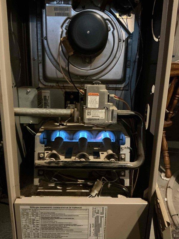 Responded to no-heat service call on a 20+ year old furnace showing diagnostic codes related to pressure switch issues. Upon inspection, cleaned components and cycled system multiple times, successfully restoring proper operation with no error codes returning. Identified clogged blower as underlying issue; recommended and replaced both blower motor and circuit board to ensure reliable system performance.