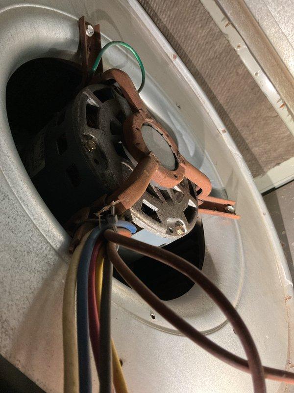Responded to no-heat service call, found blower motor completely seized with significant oxidation and corrosion. Inspection revealed large cracks in multiple heat exchanger cells, including through the high limit and on the far right cell. Due to critical safety concerns with the compromised heat exchanger, scheduled emergency replacement service for the following day.