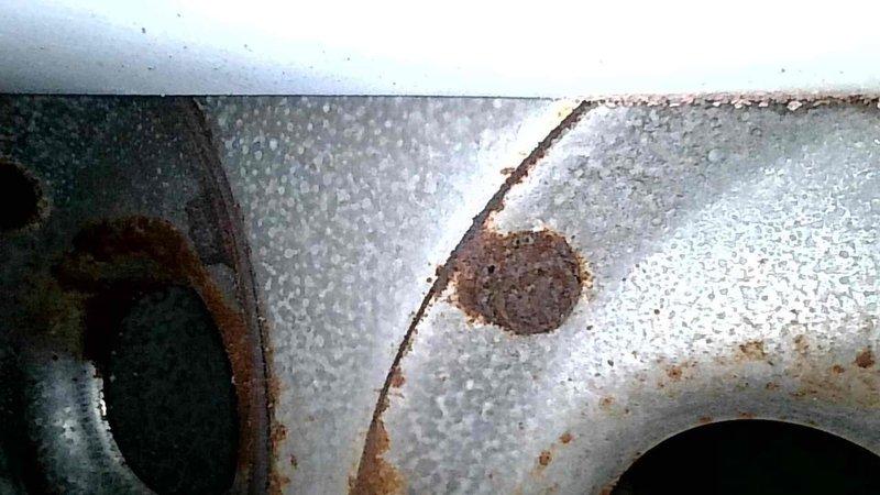 Responded to no-heat service call, found blower motor completely seized with significant oxidation and corrosion. Inspection revealed large cracks in multiple heat exchanger cells, including through the high limit and on the far right cell. Due to critical safety concerns with the compromised heat exchanger, scheduled emergency replacement service for the following day.