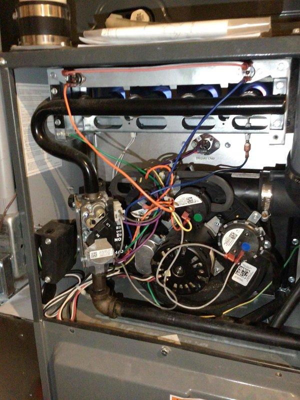 Diagnosed inoperative 4-year-old Amana heating system with no heat complaint. Verified gas supply and proper voltage to gas valve, identified valve sticking issue as root cause. Successfully unstuck valve to restore system operation and initiated warranty parts order for replacement valve.