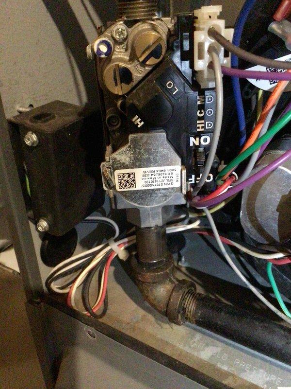 Diagnosed inoperative 4-year-old Amana heating system with no heat complaint. Verified gas supply and proper voltage to gas valve, identified valve sticking issue as root cause. Successfully unstuck valve to restore system operation and initiated warranty parts order for replacement valve.