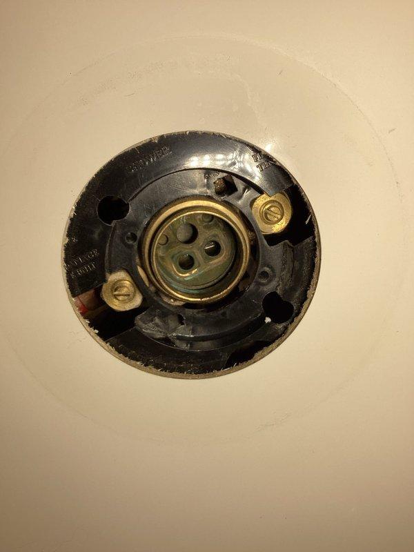 Responded to commercial water leak complaint originating from unit 210's tub valve where maintenance work was being performed with an incompletely closed shut-off valve. Discovered white water pipe with hole in ceiling above walk-in cooler causing water intrusion. Accessed ceiling space through inspection openings to assess plumbing infrastructure and electrical components potentially affected by water damage.